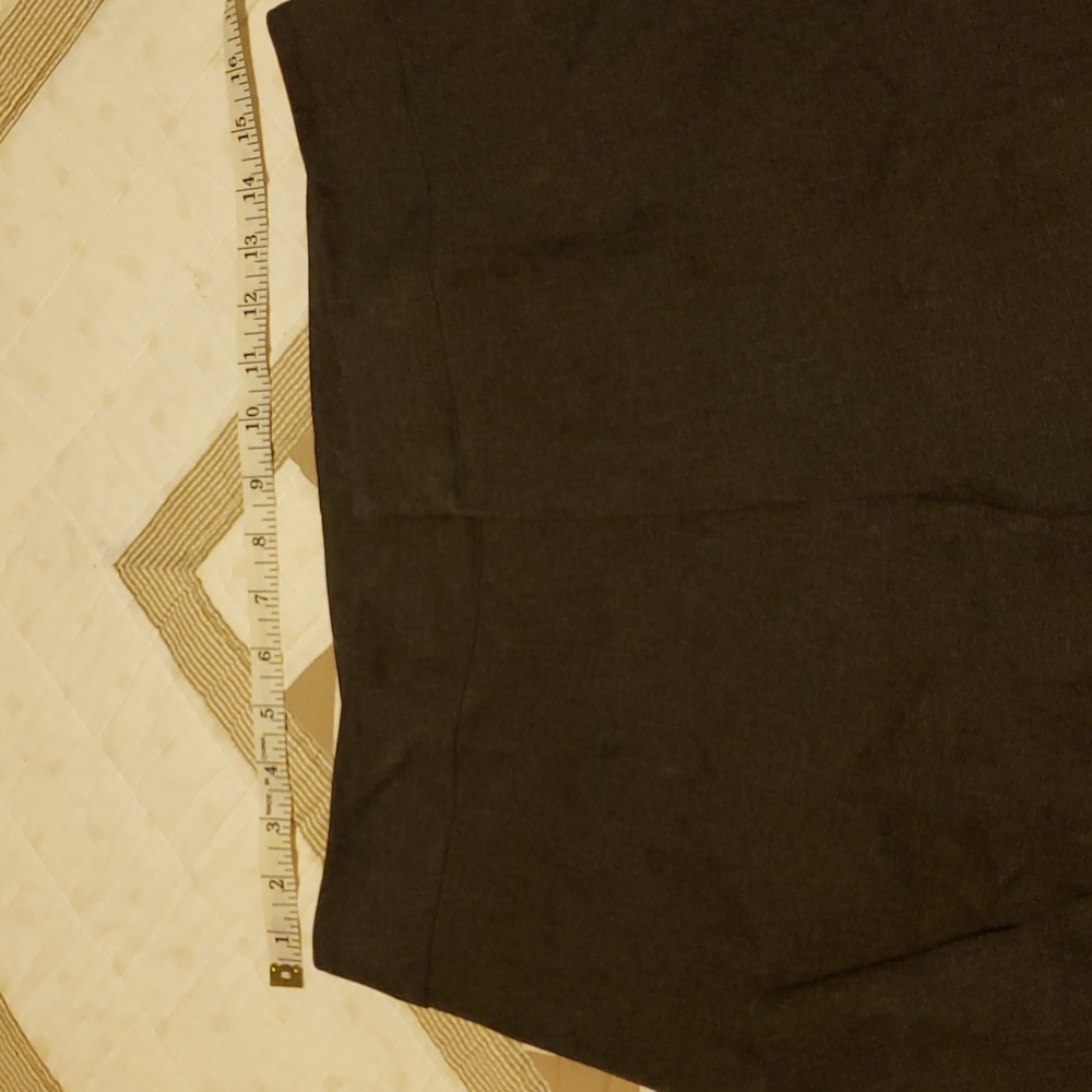 Like new grey dress pants. Zip and buttons